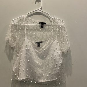 Very Cute Sheer and Pearl Top! Comes with udnerslio attached to the shirt.